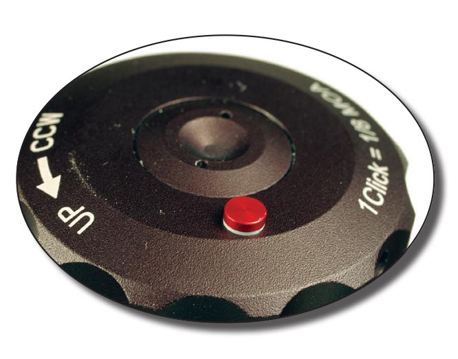 An indicator pin showing red and white indicates the turret is on its third rotation.